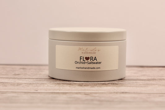 Flora-Orchid, Citrus, Saltwater, Musk wooden wick candle tin