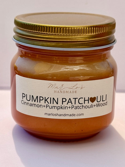 pumpkin patchouli mason jar candle with a gold lid and crackling wooden wick